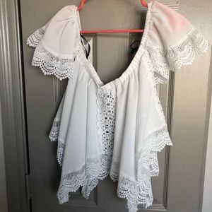 Whimsical off the shoulder white woven peasant top